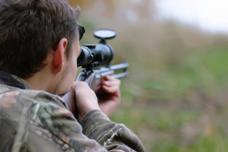 depositphotos 191239116 stock photo man in camouflage and with